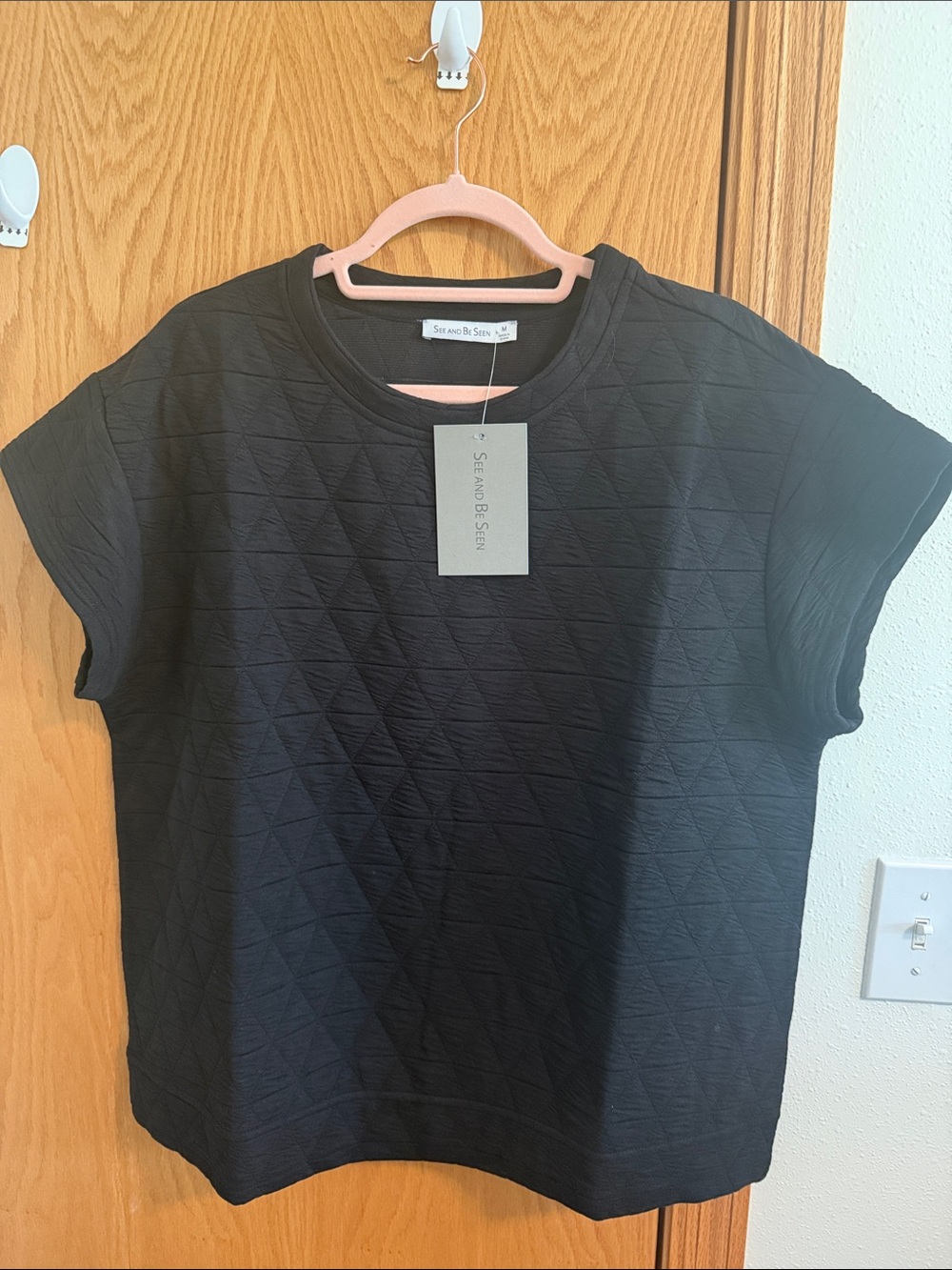 Sea and Be Seen Black Quilted Short Sleeve Tee